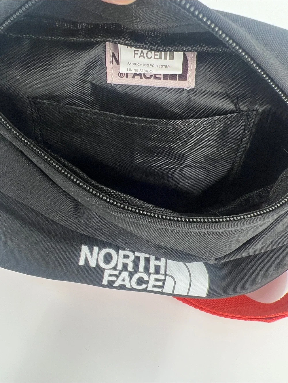 The North Face Black Belt Bag with Red Strap for Men & Women
